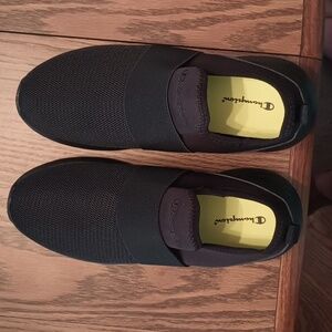 Black slip on sneakers, size 8.5, Champion brand.